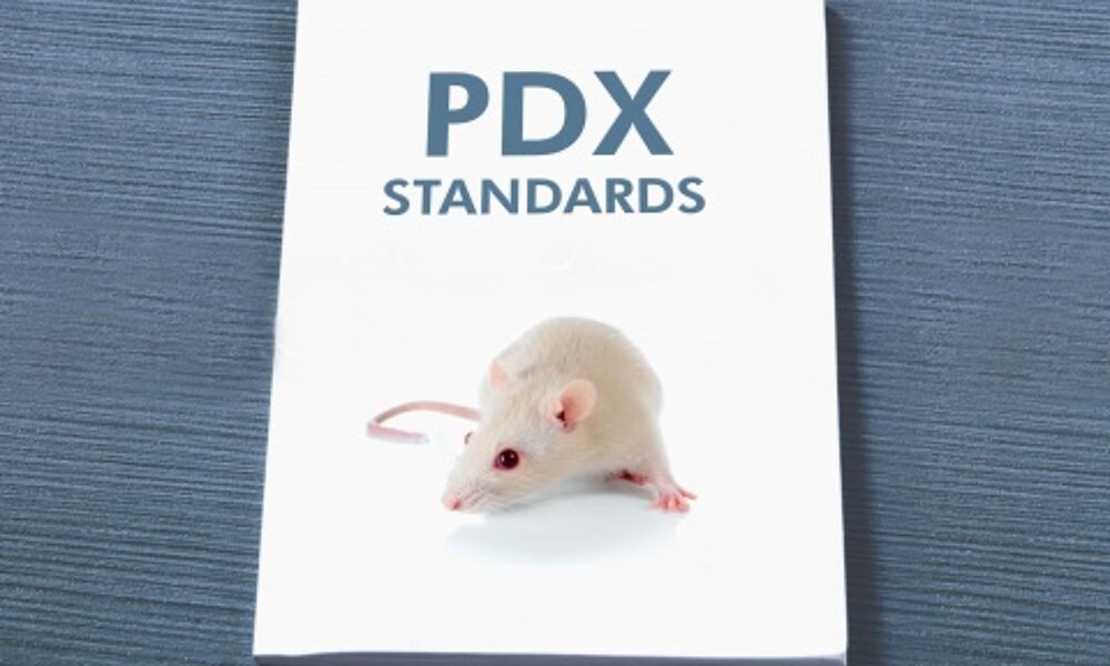 Manual entitled PDX standards with albino mouse on cover
