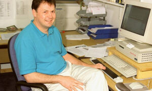 Ian Dunham at his desk in the Wellcome Sanger Institute, circa 1999.
